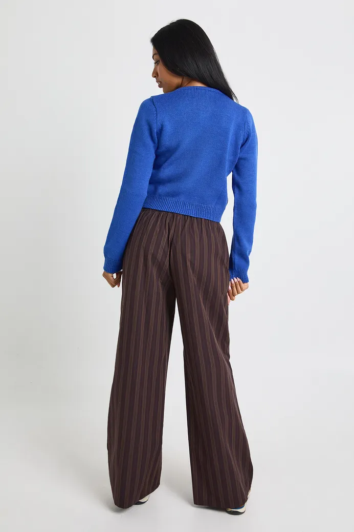 Pantaloni eleganți cu crac larg